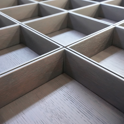 Grooved wood veneer and open compartments for cabinets